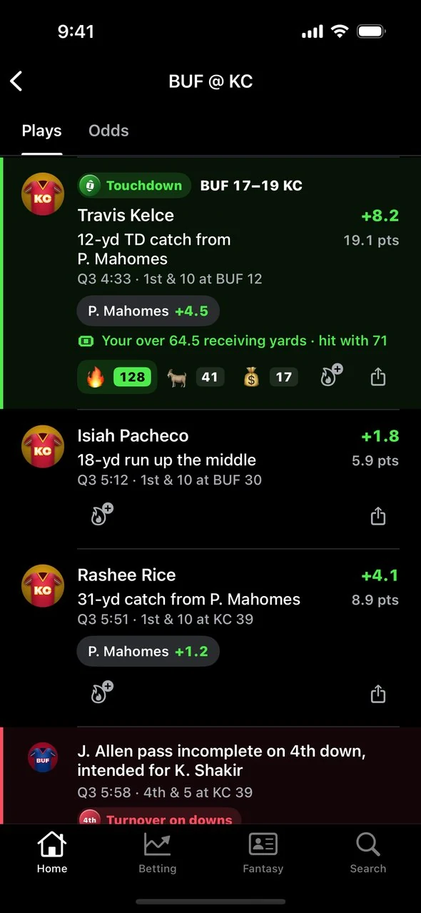 Game screen play-by-play with a touchdown row, fantasy points and reactions